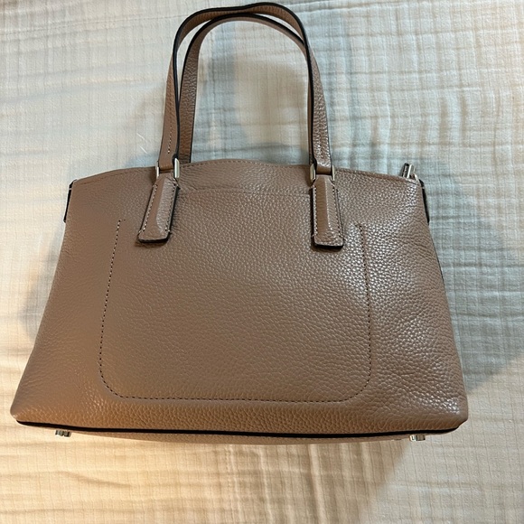 Kate Spade satchel with crossbody strap between a cream and tan color - Picture 3 of 4